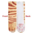 Detailed front and back view of 3D animal paw socks featuring orange tabby cat print - Calico Cat