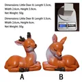 Niedliches Set aus orangefarbenen Reh-Figuren aus Harz für Deko und Miniaturlandschaften - Paar Hirsche