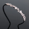 Serre-tête fleur rose avec strass clairs et perles irisées sur fond noir - Petite fleur papillon-Gris