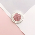 Macro view of round silver charm with pink rhinestones and white pearls for DIY crafts - Silver Round Pink