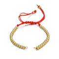 Macro detail of red woven rope bracelet with gold metal beads on a white background - Lucky Bead Woven Rope / Red (Q0221)