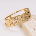 Vintage hollow out gold plated stainless steel bracelet with zircon inlay on beige stone - Gold