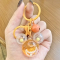 Orange mouse shaped liquid quicksand keychain with glitters and mini white pearls - Mini Mickey Head Sparkle - Orange