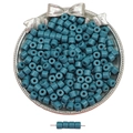 Blue-green cylindrical acrylic macaron beads in a decorative bowl for DIY jewelry - Dark Blue