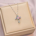 Elegant titanium steel cross necklace featuring multi-colored gemstones in silver finish - 6054 Cross Color Zircon / Silver