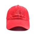Detail of dark red cotton baseball cap showing unique tie-dye texture and curved brim - Red Tie-dye