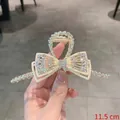 Elegant gold bow hair claw clip with rhinestones and white pearls, 11.5cm length - Bowknot Rhinestone Faux Pearl Claw