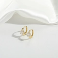 Elegant gold pear-shaped drop earrings with clear zircon and white enamel details - White