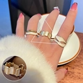 Three gold open rings with colorful shell and enamel inlay worn on a model hand - JZ6133 Gold Enamel Shell Multi-Piece Ring Set