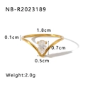 Detail view of gold V-shaped ring with pear-cut zircon and precise size measurements - US 7 / V-Shape Pear Zirconia Style (NB-R2023189)