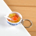 Ciondolo mini ciotola in porcellana bianca e blu con frutta gialla e sciroppo chiaro - Zuppa dolce