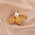 Exquisite bee brooch featuring enamel wings, a large white pearl and zircon accents - Style 9