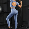 Close-up of blue marl seamless yoga set with open back top and high waist leggings - S / Blue