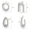 Set of 4 modern minimalist white ceramic vases with organic shapes and matte finish - White Ceramic Vase Set (four Pieces)