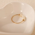 Elegant gold minimalist ring featuring five white pearls and two golden beads - Gold Beaded Pearl Ring