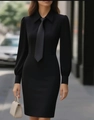 Close-up of stylish black long-sleeve dress with matching necktie and slim waist design - S / Black