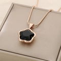 Macro shot of rose gold flower pendant with black faceted stone on a snake chain - Rose Gold (KN288350-KFC)