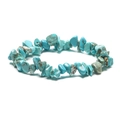 Close-up of irregular turquoise stones with natural brown veins on a minimalist bracelet - Turquoise