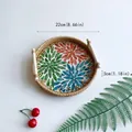 Handwoven rattan tray with colorful floral mosaic base and wood handles, 22cm diameter - Red, Blue & Green / Small 22x3cm