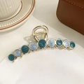 Pinza dorada para el pelo con cuentas redondas de mármol azul y efecto ojo de gato - Metal Dorado/Resina Azul Mármol / Relleno de esmalte