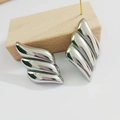 Polished silver geometric wing earrings in high-quality stainless steel for women - Silver