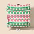 Close-up of flannel Christmas blanket with gingerbread and Season's Greetings prints - Style 50 (Season's Greetings Stripe)