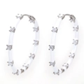 Detail of silver hoop earrings with white enamel coating and micro-set zircon crystals - Silver White