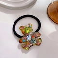 Schildpatt-Haargummi in Bärenform mit bunten Strasssteinen und Gummiband - Irisierendes Gelb