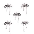 Detailed view of five silver alloy hollow bow pendants for DIY jewelry crafting - No. 4 Bowknot-Silver-18*24mm