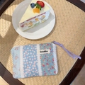 Pochette trucchi azzurra a fiori con etichetta Sozakka e tirazip viola - Ramo a Strisce