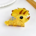 Cute yellow acrylic dinosaur hair claw clip with purple spots for girls and children - Triceratops