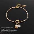 Elegant 14K gold plated stainless steel tennis bracelet with letter W and crystal charms - Letter W