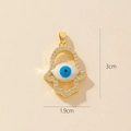 Golden Hamsa hand pendant with blue evil eye enamel and rhinestones, 3cm x 1.9cm size - Gold Hamsa Hand Evil Eye Pendant (25-8)