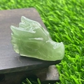 Green semi-transparent natural stone dragon head carving crafted from gemstone - Green Aventurine
