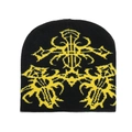 Detailaufnahme der schwarzen Strickmütze mit gelbem abstraktem Jacquard-Totem-Muster - Schwarz und Gelb