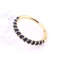 Macro view of gold-plated spiral ring featuring black enamel detail and adjustable open band - Adjustable Open / Black