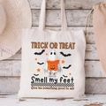 White canvas tote bag featuring cute Halloween ghost and Trick or Treat print - Trick or Treat Ghost with Pumpkin