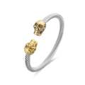 Hip hop cable wire open bangle featuring silver twisted rope and gold skull heads - Steel Gold