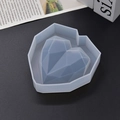 Detailopname van 3D geometrische hart siliconen mal voor hars en zeep op grijze basis - Groot