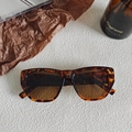 Retro oversized tortoiseshell square sunglasses with dark brown lenses on white stone - Leopard 7