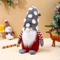 Close-up of Nordic Christmas gnome doll with a red body and grey polka dot felt hat - Grey Hat Short Leg Standing Gnome