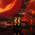 Detail of Halloween witch lantern with spooky silhouettes and flickering candle light - Castle Witch Lantern