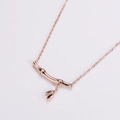 Collana a forma di bambù oro rosa con ciondoli a foglia su sfondo bianco - Oro rosa