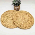 Set of two handmade circular woven water hyacinth placemats for heat insulation - 20cm / Water Hyacinth Style