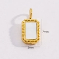 Detailed view of rectangular 14K gold-plated shell pendant with 7mm by 5mm dimensions - Rectangle Mother of Pearl Inlay