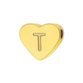 Detail of heart-shaped gold bead with T letter engraving and hole for jewelry making - Letter T
