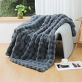 Detail of dark grey thick faux rabbit fur blanket with luxury 3D bubble texture on a chair - Dark Gray