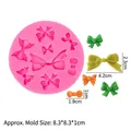 Pink silicone mold featuring multiple bow tie shapes for cake decorating and DIY crafts - Bowknot / Pink