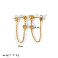 Dettaglio orecchino a catena dorata da 60 mm con incastonato uno zircone da 4,8 mm - Stile Catena a Sfera Dorata(TE6761-G)