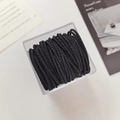 Set aus dicken schwarzen hochelastischen geflochtenen Haargummis in einer Acrylbox - Schwarz in Box (50 Stück/Packung)
